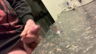 Cumming in a measuring glass