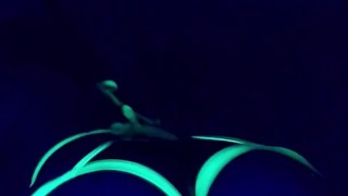 Glowing ebony ass under blacklight