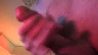 Close up cock view of guy jacking off watching Porn, with hot Cumshot!