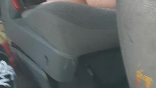 Wife with lube bottle in back of van