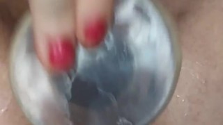 Slutty Milf fucks pussy until she squirts