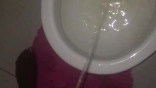 taking a piss