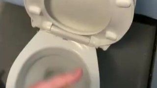 Masturbating in public toilets with big cumshot 