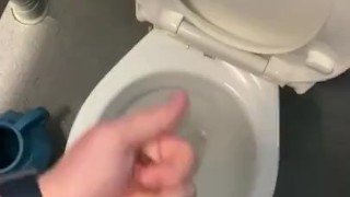 Masturbating in public toilets with big cumshot 