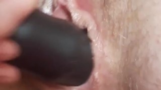 MILF opens pussy and has fun with toy