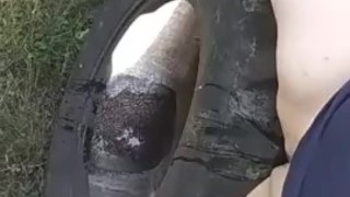 Peeing off a tractor tire
