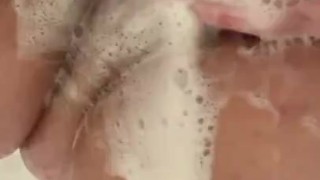 Spreading soapy fat pussy in shower 