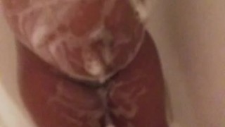Spying on ebony pregnant in the shower