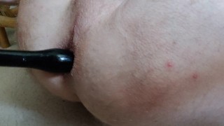 Guy play with ass toy.