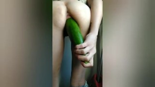 Bored milf learning to fist herself and fuck herself with a huge zucchini 