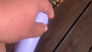 Bbw using toy outside on her porch