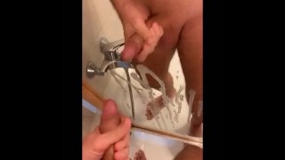 Big cumshot onto the mirror