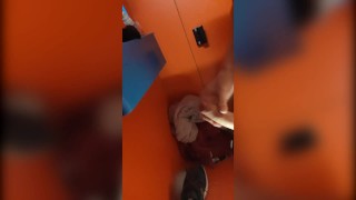 Twink being fucked bareback in a pool's stall and jerks his big cock
