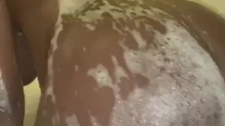 Pregnant pussy taking a bubble bath