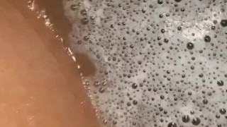 Pregnant pussy taking a bubble bath