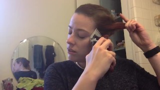 Shaved head fetish girl shaves her own head