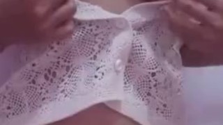 Sexy little asian doll teasing her beautiful breasts