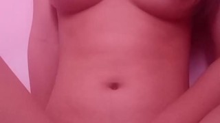 rubbing her pussy