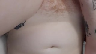 Redhead does a strip tease