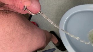 Pissing through a urethra plug - stimulate the flow through penis