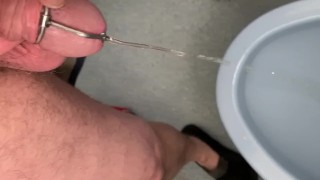Pissing through a urethra plug - stimulate the flow through penis
