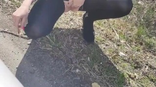 Pissing at the side of the road