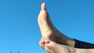 Warming my feet in the sun - Foot fetish -