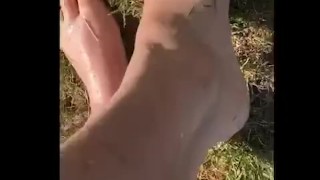 Wet feet playing in grass