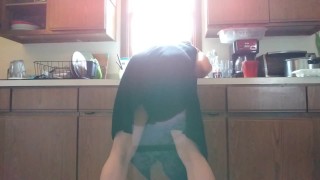 Hot goth tgirl pisses herself doing the dishes