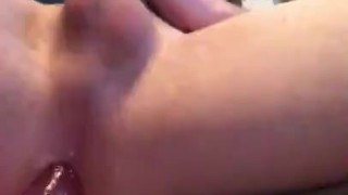 Sissyboy plays with dildo