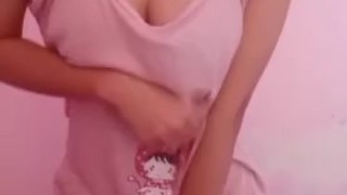 Asian teen showing off cute pink dress for daddy