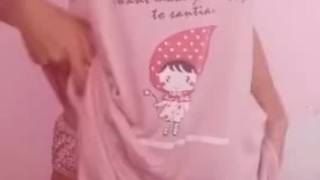 Asian teen showing off cute pink dress for daddy