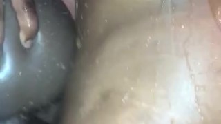 Shower fuck with toy