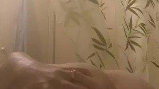Horny teen plays with herself in shower 