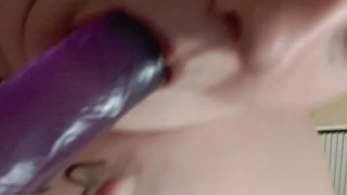 Me sucking on a purple jelly dildo then fucking myself~