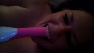 Horny slut deep throats her vibrator