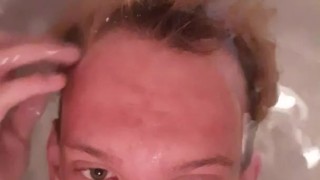 Very skinny teen shows himself putting his head underwater