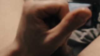 Guy masturbating watching porn POV
