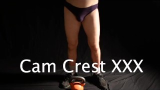 Kettle Bell Workout in a Black Speedo
