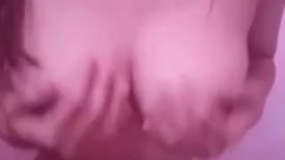 Cute asian busty teasing her body in schoolgirl skirt