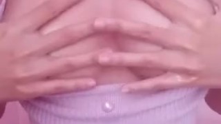 Tiny busty asian teen massaging her tits with oil