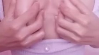 Tiny busty asian teen massaging her tits with oil