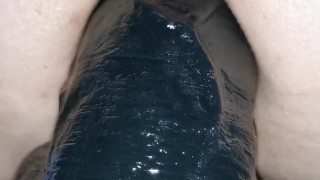 Super close up big anal dildo insertion