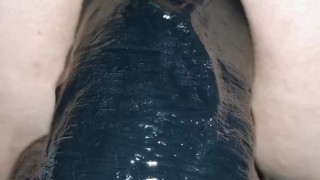 Super close up big anal dildo insertion