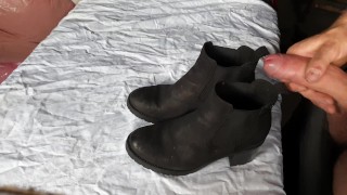 Cumming on her ankle boots
