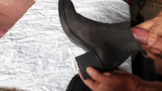 Cumming on her ankle boots