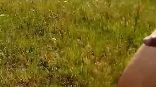 Naked walking in field flashing by main road with balls tied up 