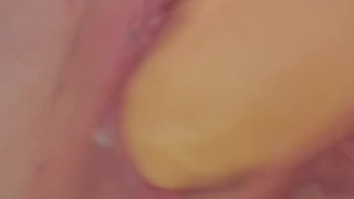 Redhead cums on toy and licks the cum off