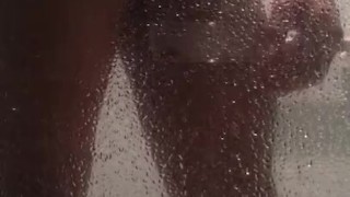 Uncut Latino playing with ass and cock in shower
