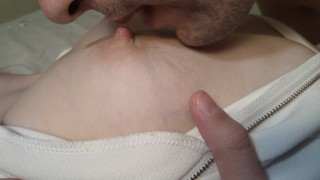 Close up licking and biting her sweet nipple